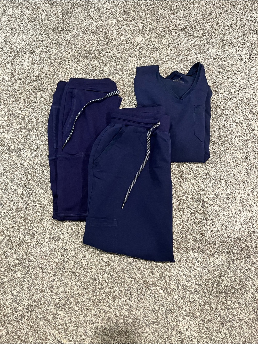 Women's Navy Jaanuu scrub bottoms and top